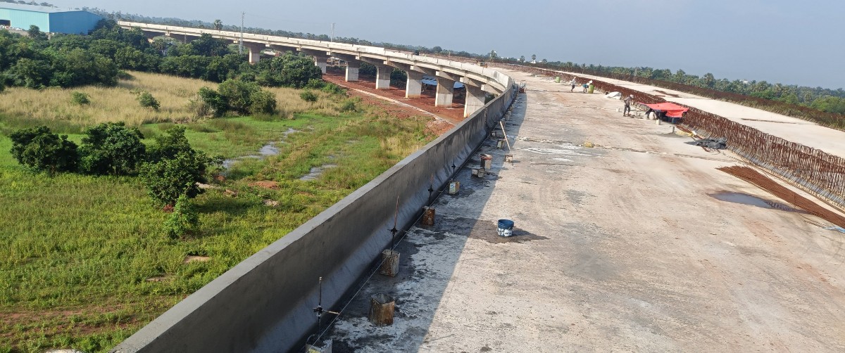 Siddhivinayak BRIDGE PARAPET BY SLIPFORM PAVER SP 1080
